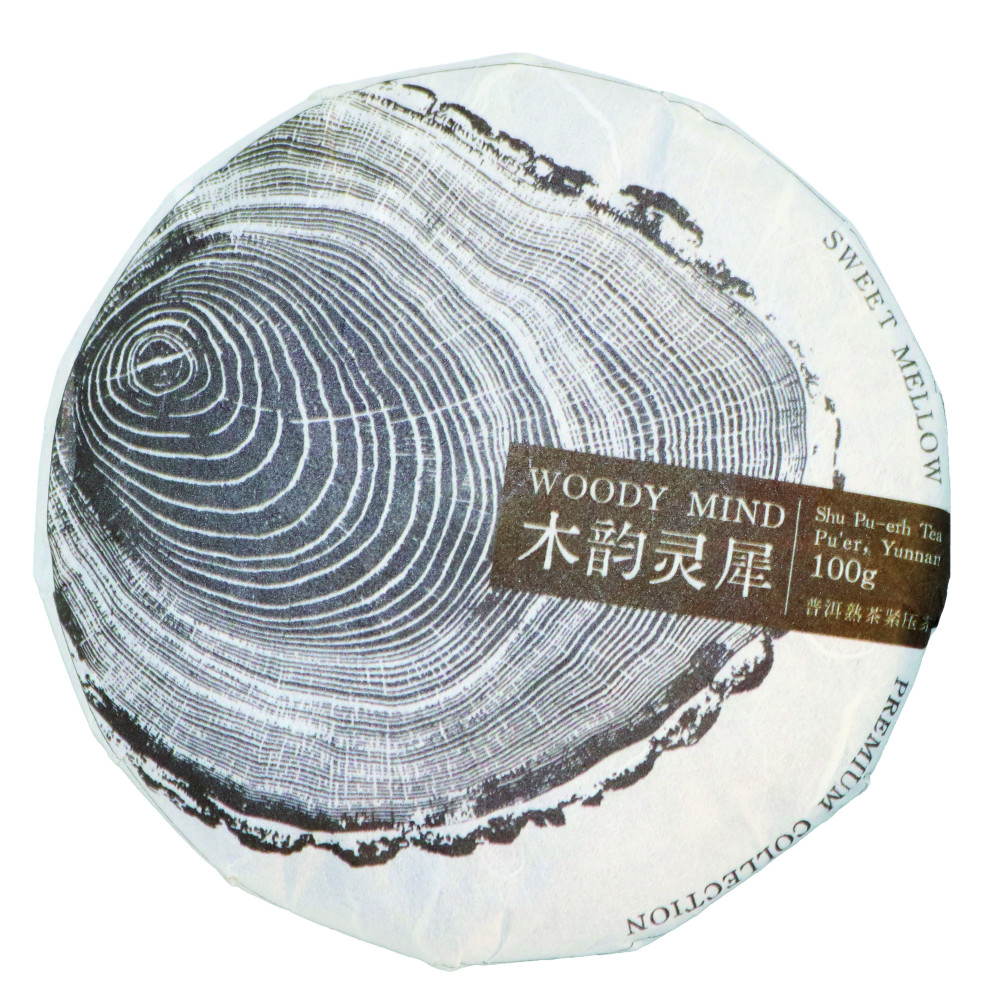 Galette de pu-erh Wu Liang Mountain de 100 g, feuilles brun foncé aux pointes cuivrées